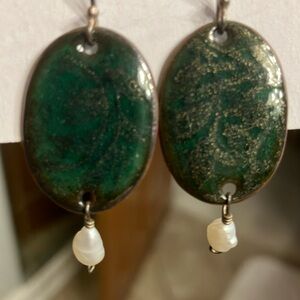 Beautiful glazed dark green oval drops w/geniune fresh water pearl.  3/4”oval.